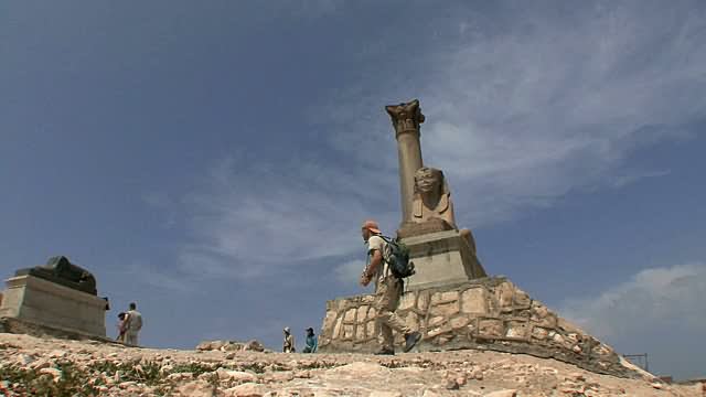 Pompey's Pillar And Granite Sphinx In Alexandria, Egypt