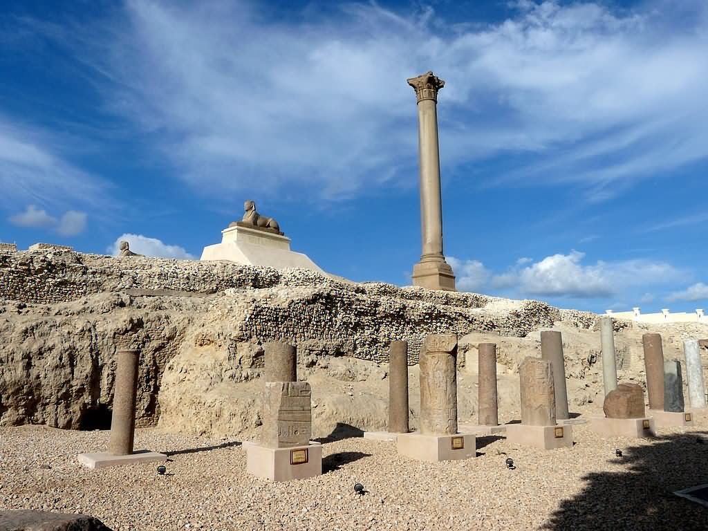 Side View Of The Pompey's Pillar And Sphinx