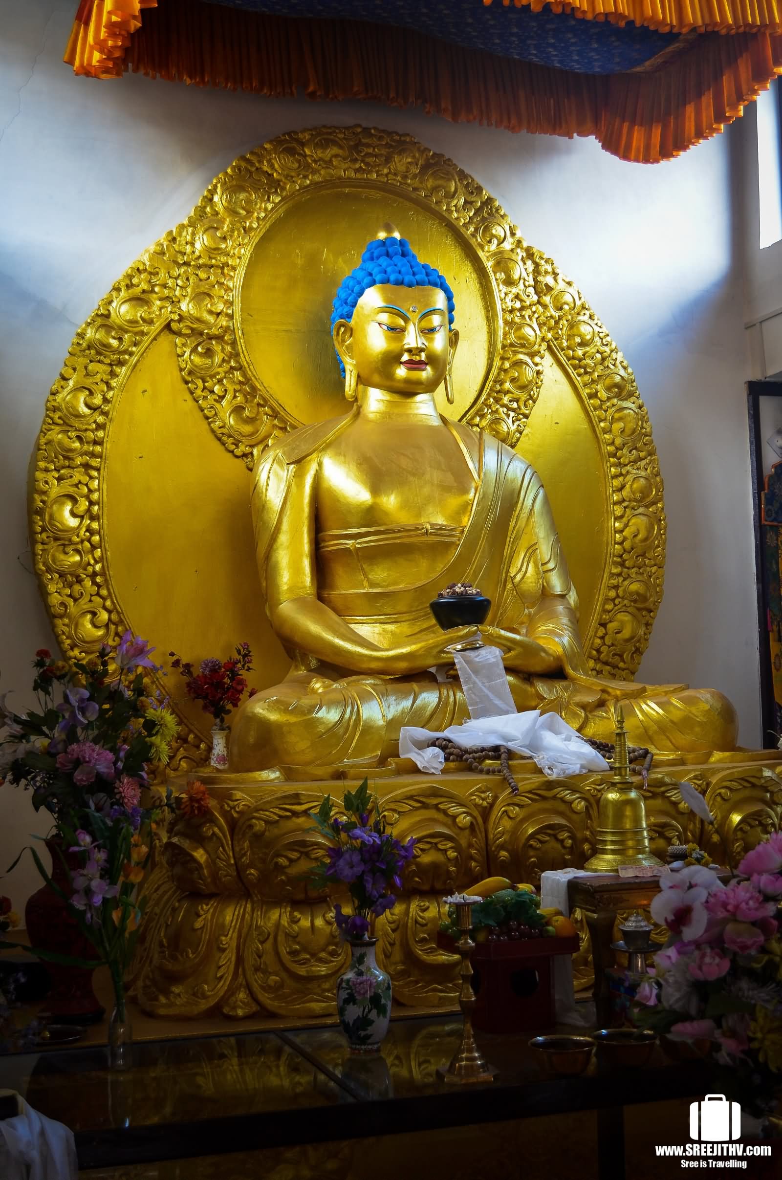 Lord Buddha Golden Statue Inside The Shanti Stupa