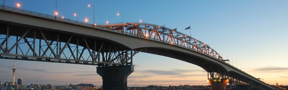 Panorama View Of The Auckland Harbour Bridge During Sunset