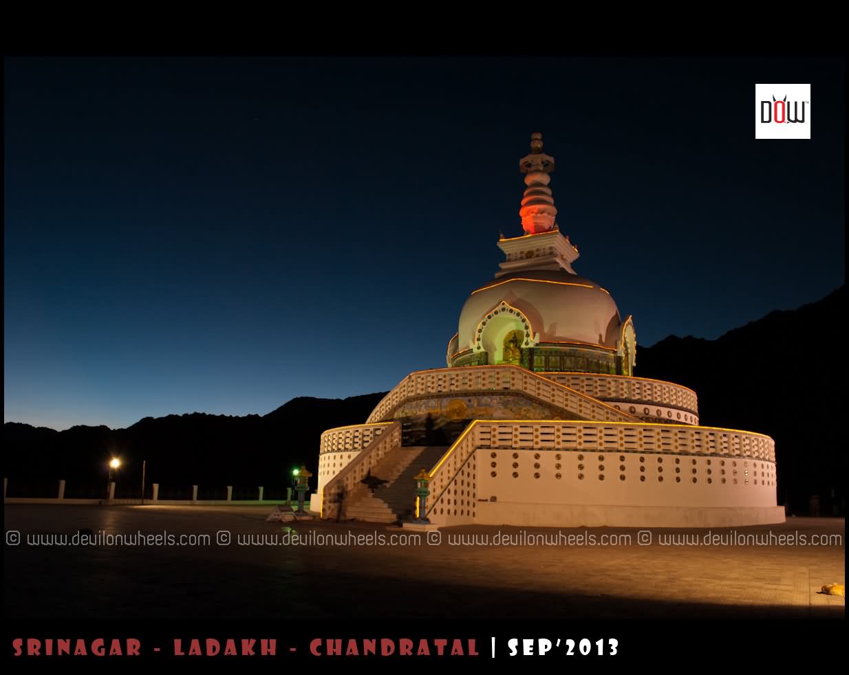 Side View Of Shanti Stupa Lit Up At Night