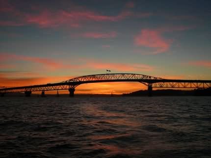 Sunset View Of The Auckland Harbour Bridge