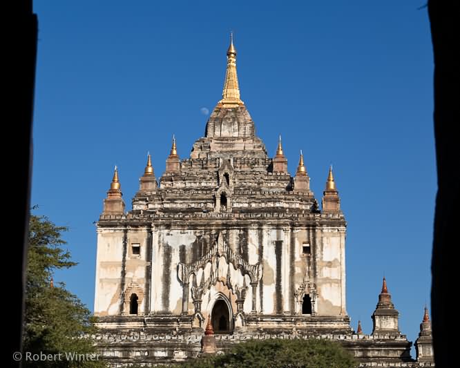 Thatbyinnyu Temple Through The Doorway Of The Nathlaung Kyaung Temple