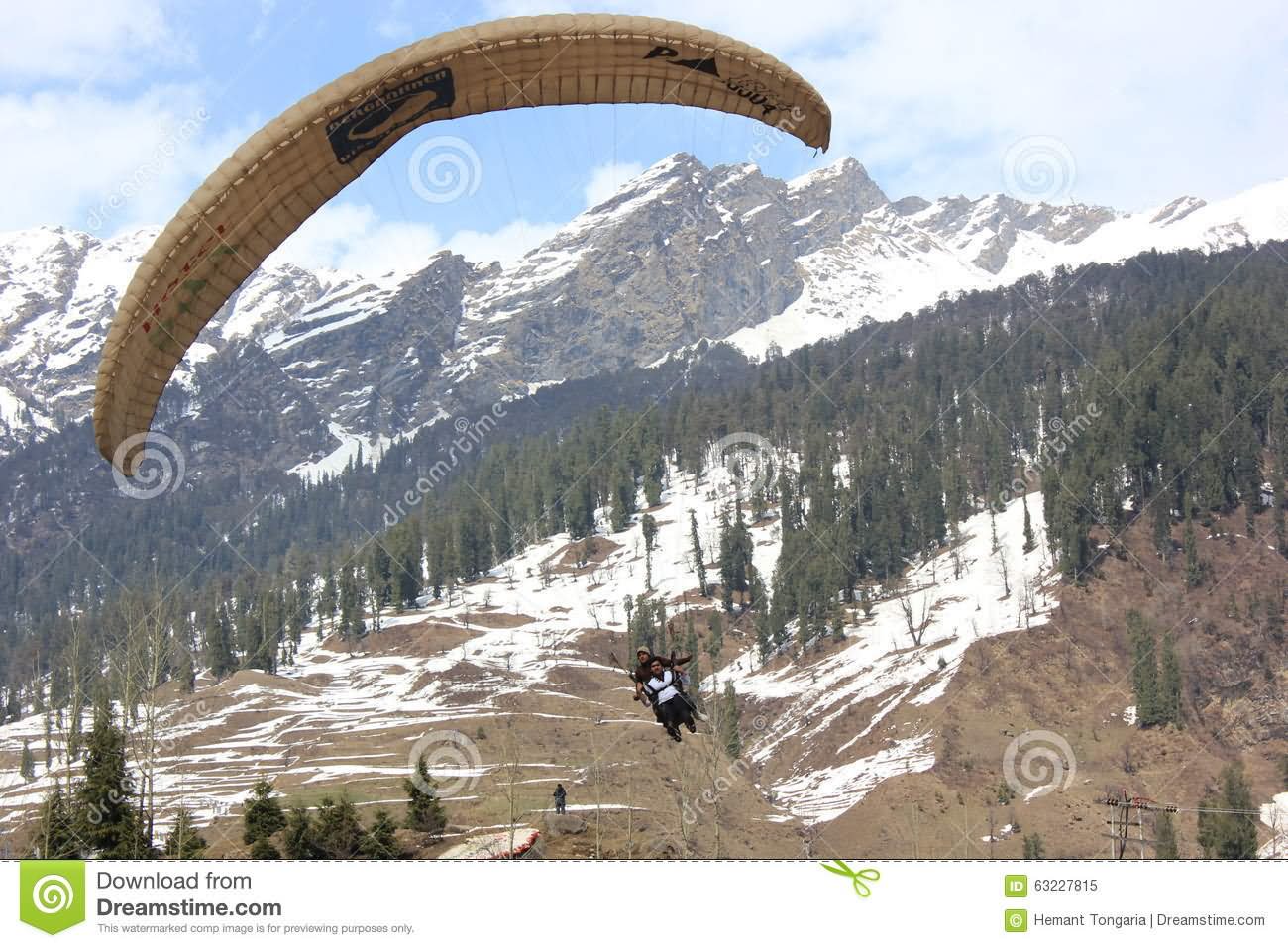 Tourist Enjoying Paragliding At Solang Valley