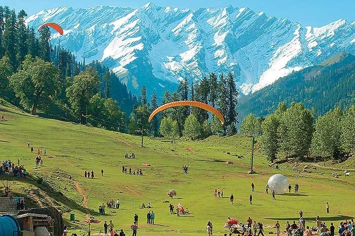 Tourists Enjoying Paragliding And Zorbing At Solang Valley