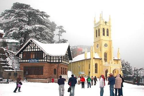 Tourists Enjoying Snowfall In Front Of Christ Church Shimla