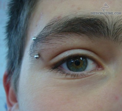 Amazing Cat Eye Piercing With Silver Barbell