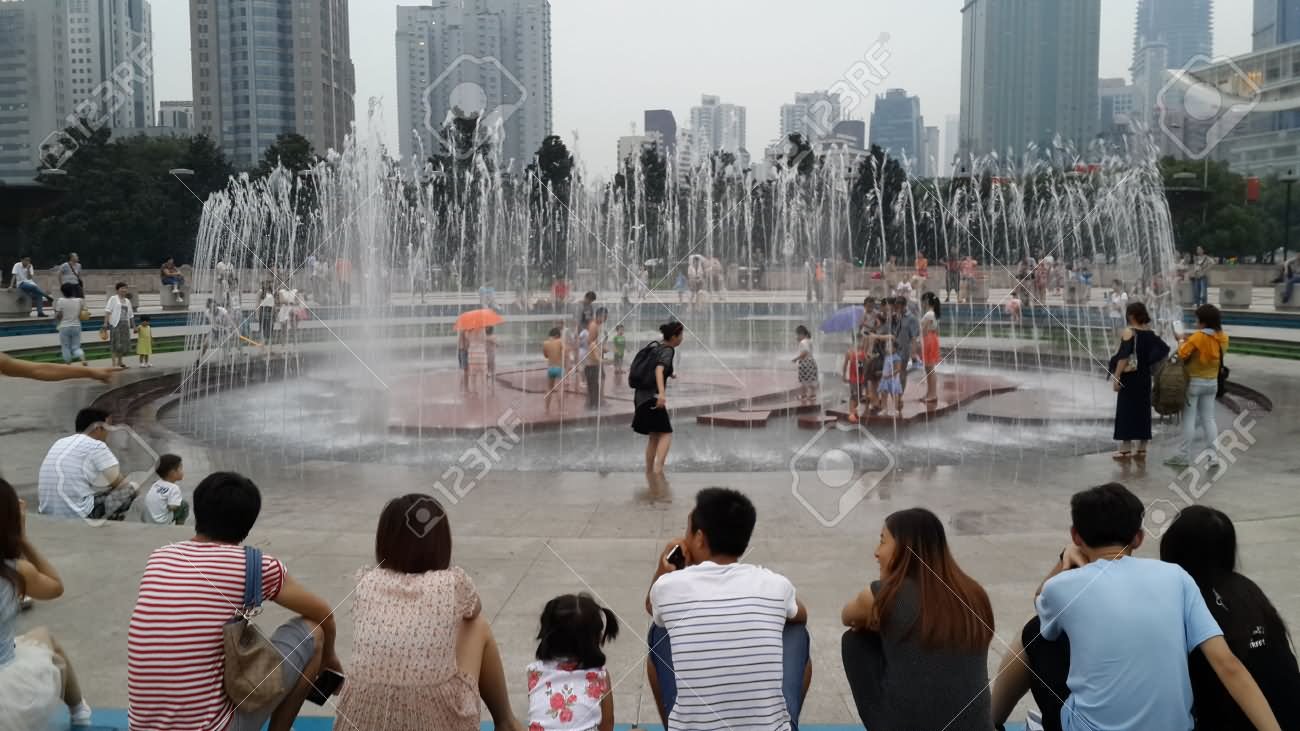 Children Playing In The Water Fountain At People's Square In Shanghai