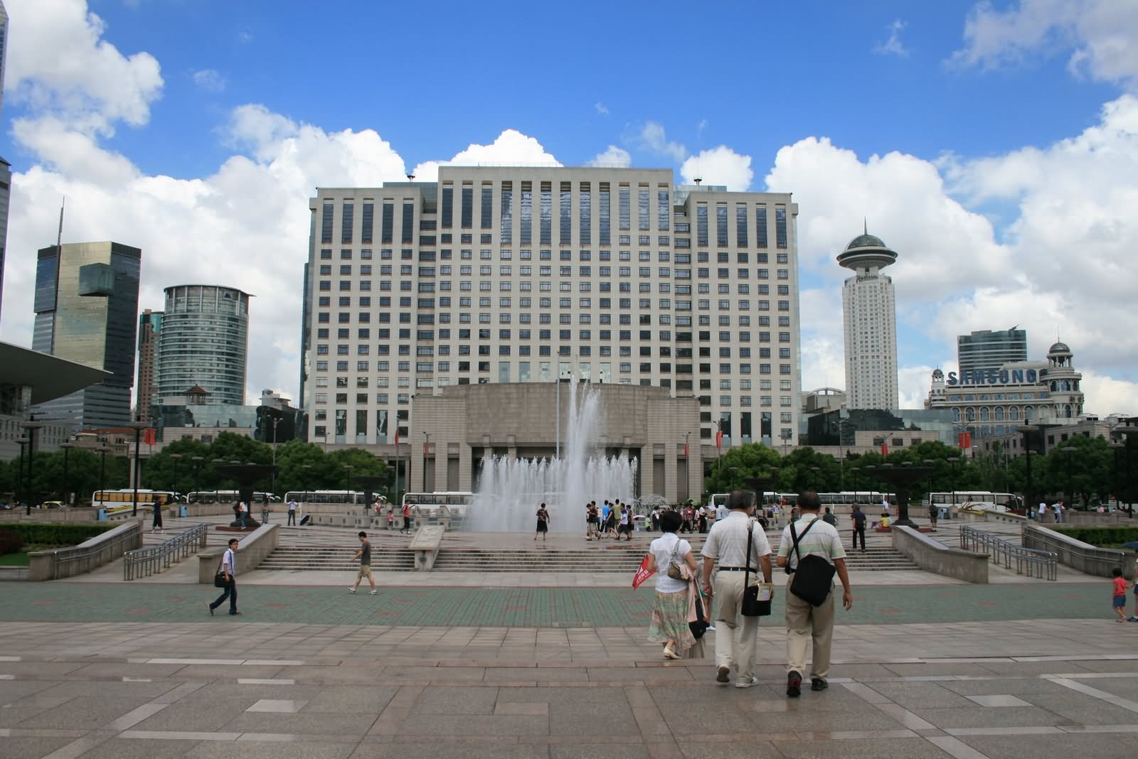 Fountain At The People's Square With Surrounding Buildings In Shanghai