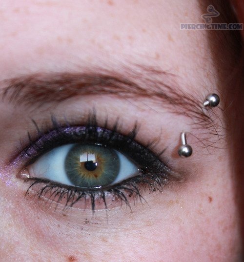 Silver Curved Barbell Cat Eye Piercing Idea