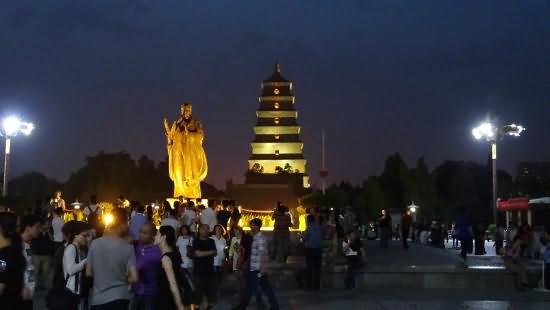 Statue In Front Of Giant Wild Goose Pagoda Adorable Night View