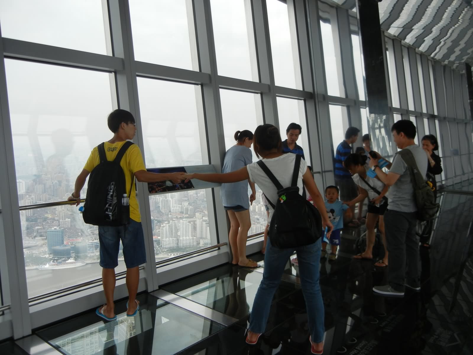 Tourists Inside The Oriental Pearl Tower Glass Floor