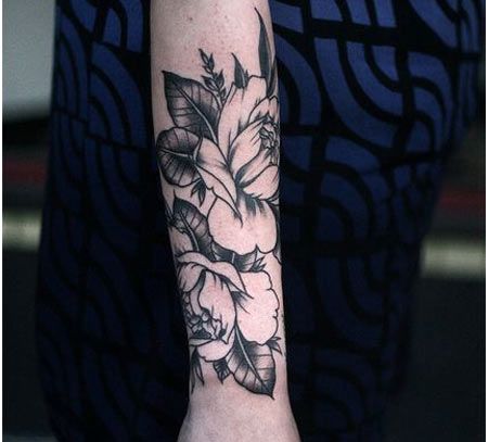 Black Ink Flowers Tattoo On Right Forearm