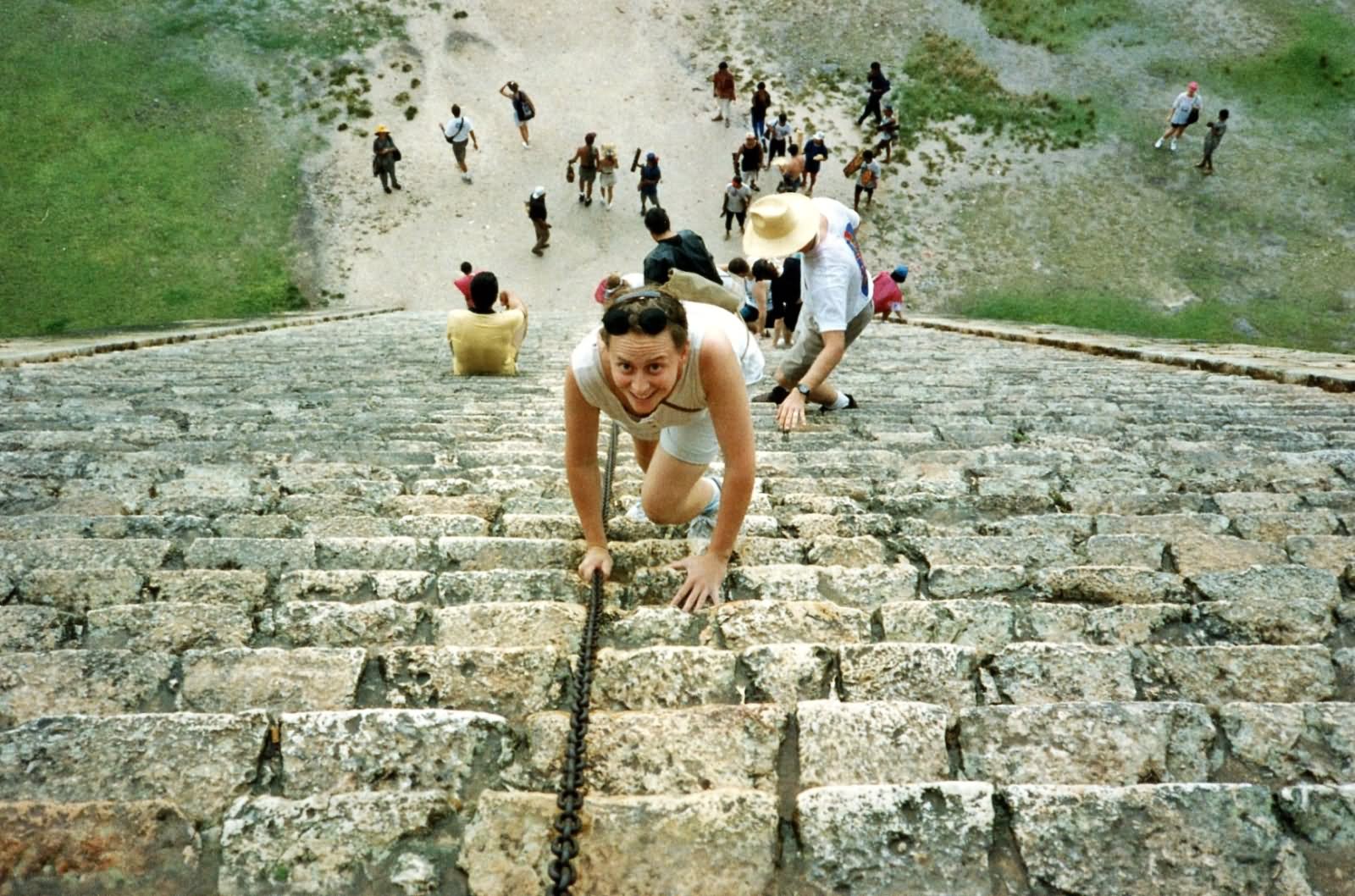 Climbing At The El Castillo Pyramid In Mexico