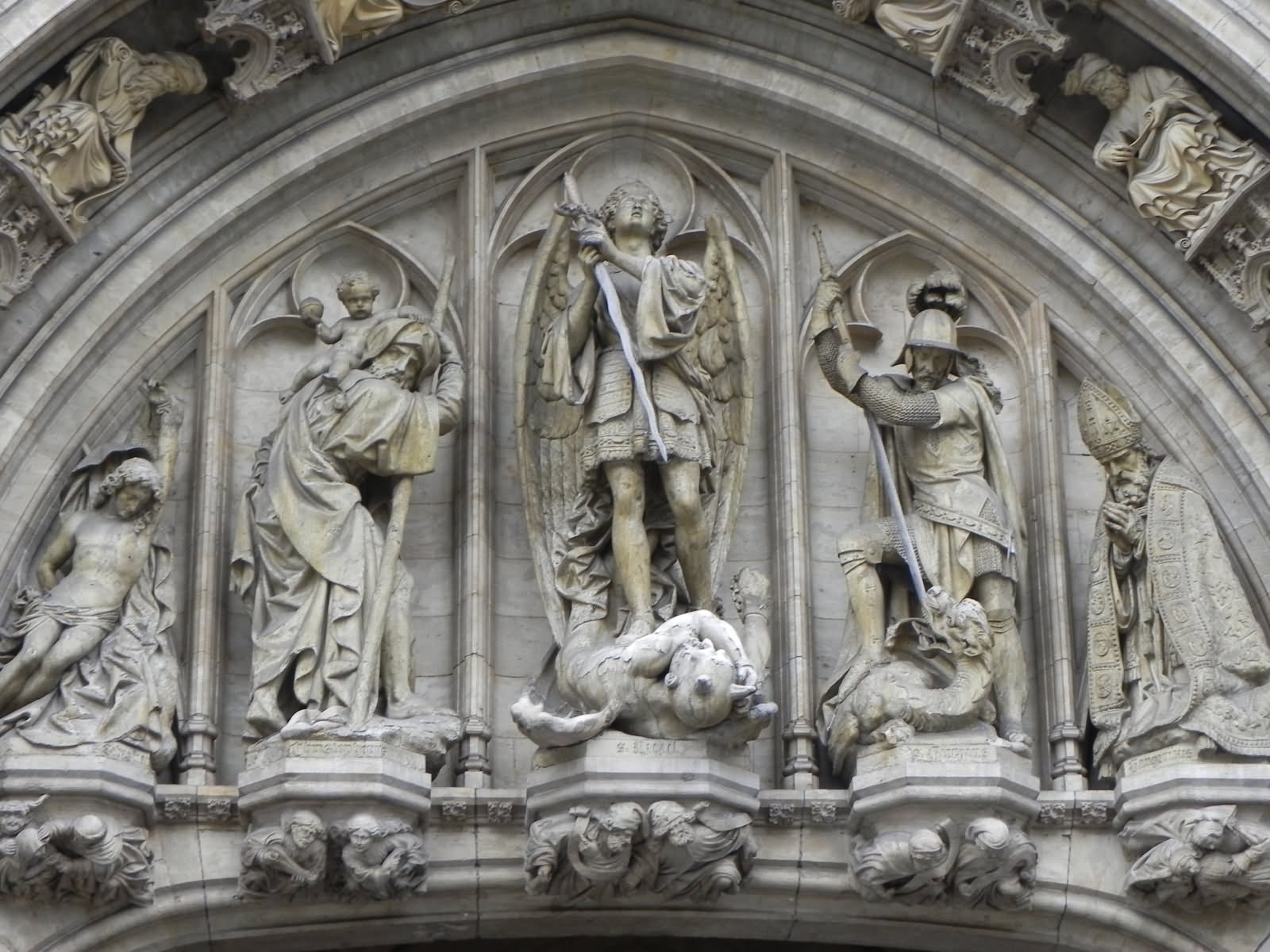 Closeup Of The Statues On The Doorway Entrance Of The Leuven Town Hall