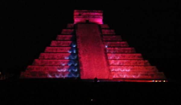 El Castillo Lit Up With Red Lights At Night