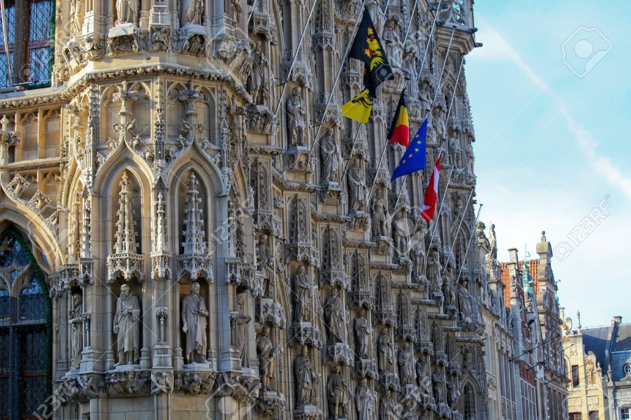 Flags Hanging On The Leuven Town Hall In Belgium