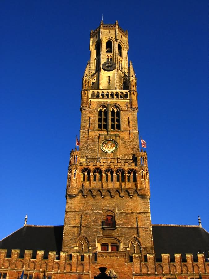 Front View Of Belfry Tower At Night In Bruges, Belgium