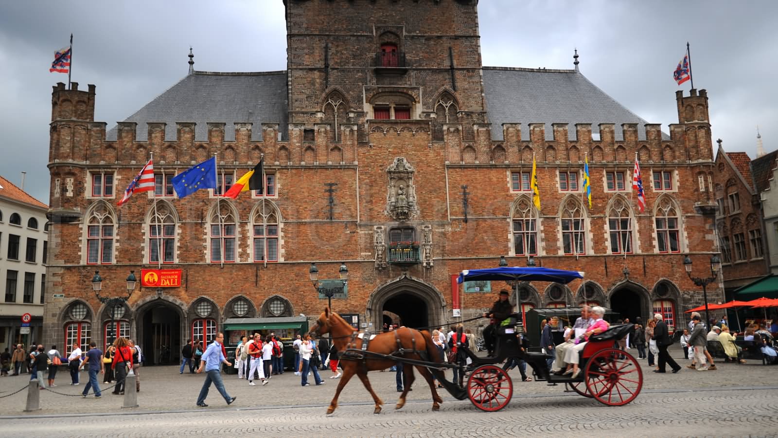 Horse Cart Passing From The Belfry of Bruges In Belgium