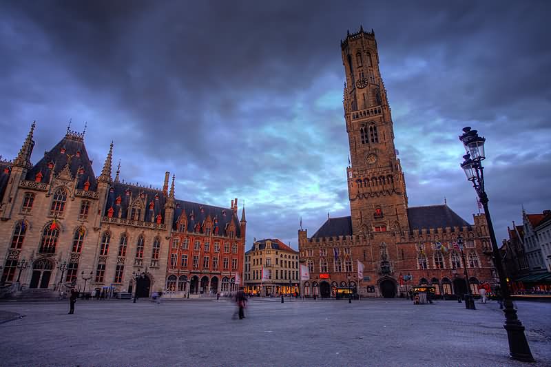 Incredible View Of The Belfry of Bruges With Black Clouds