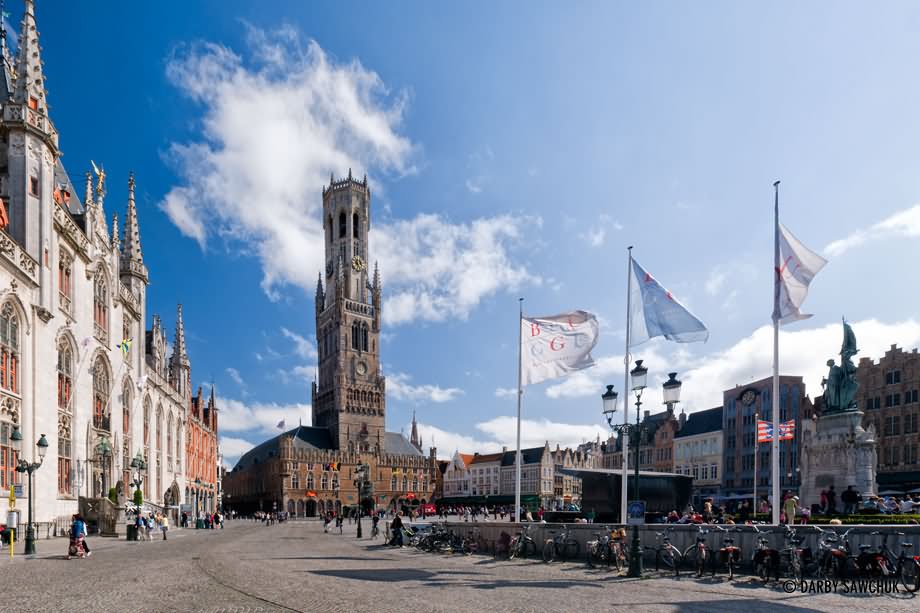 Market Square And The 13th Century Belfry of Bruges In Belgium