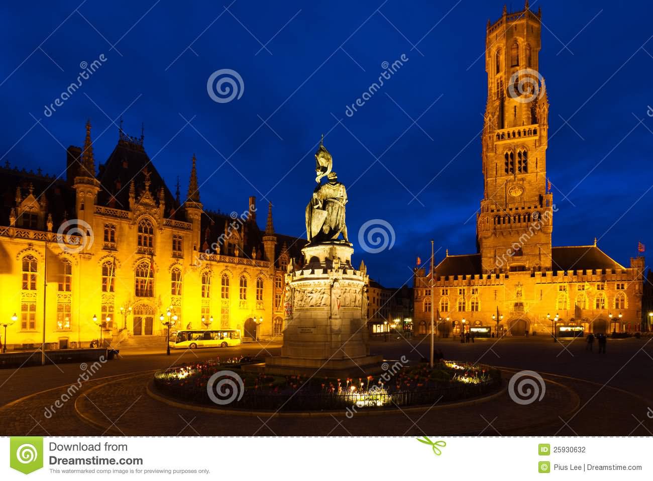 Statue In Center Of Grote Market And Belfry Of Bruges In Belgium