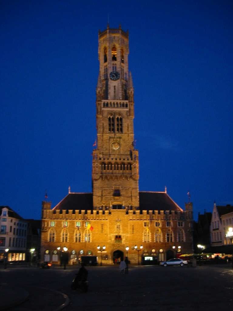 The Belfry Tower of Bruges In Belgium At Dusk