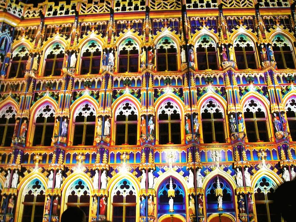 The City Hall In Leuven Looks Magnificent With Colorful Lights At Night