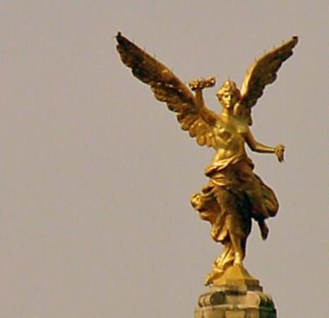 The Golden Statue Of Angel Of Independence In Mexico