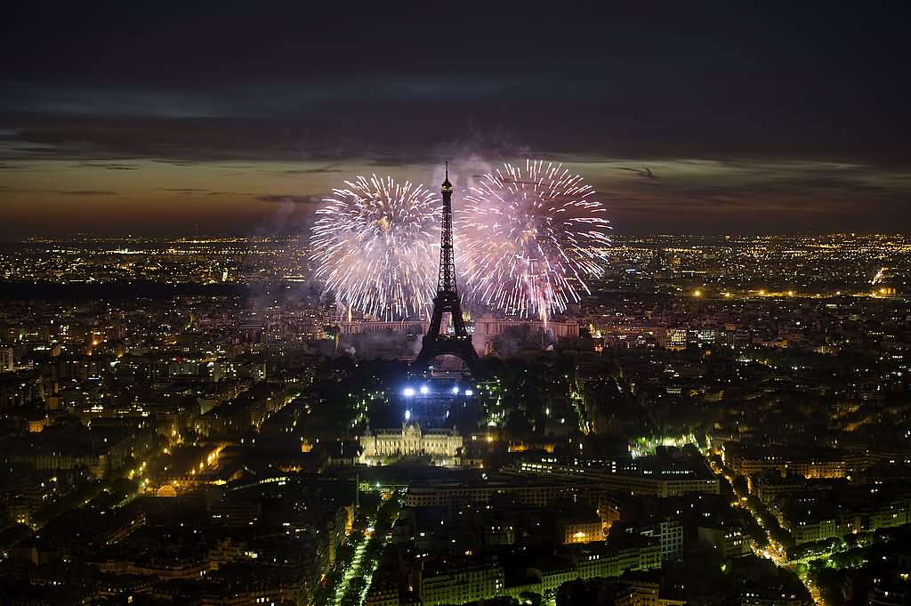 Adorable View Of The Bastille Day Fireworks Bursts Over The Eiffel Tower