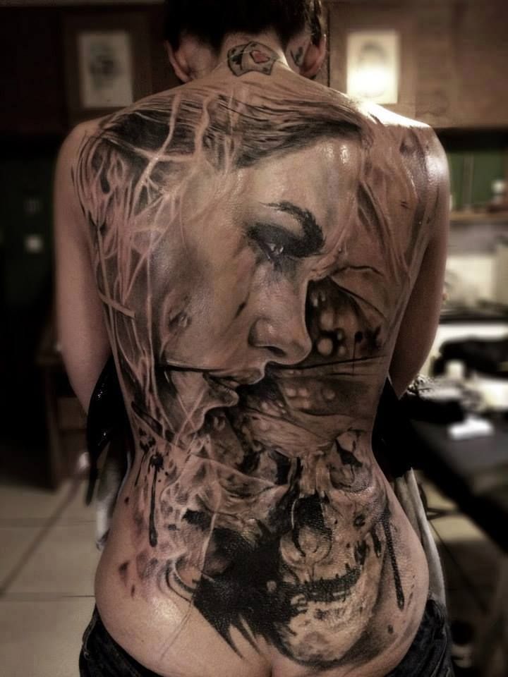 Grey Ink Girl Face With Skull Tattoo On Full Back