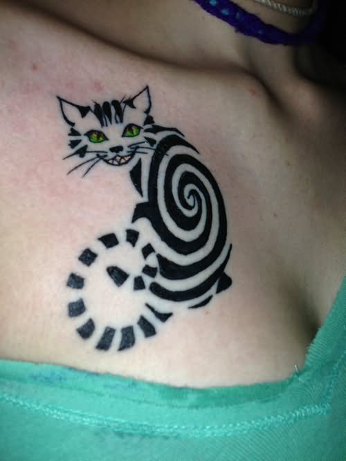 Nice Black Ink Spiral Cheshire Cat Tattoo On Front Shoulder