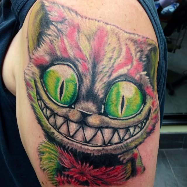 Nice Colored Cheshire Cat Tattoo On Left Shoulder