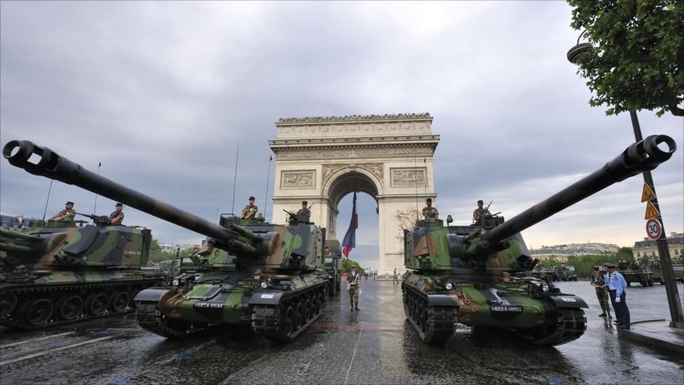 Tanks Prepare To Move Down The Champs-Elysee During Bastille Day Parade