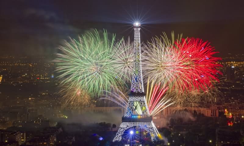 The Eiffel Tower Illuminated During The Bastille Day Fireworks Display In Paris