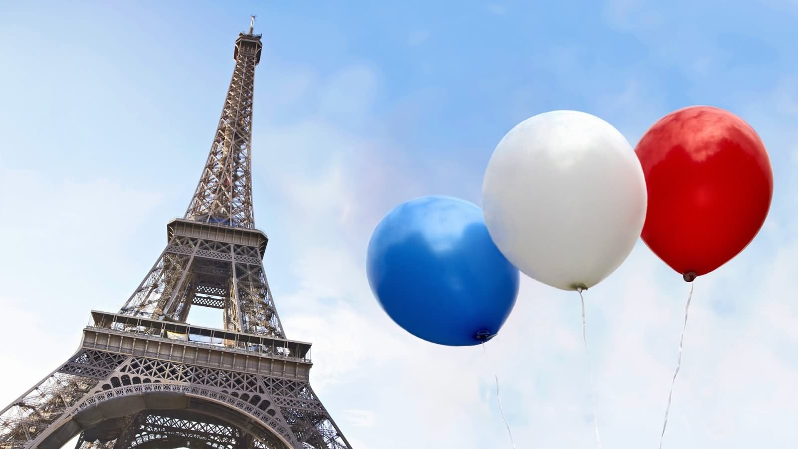 Tri Color Balloons With Eiffel Tower During The Bastille Day