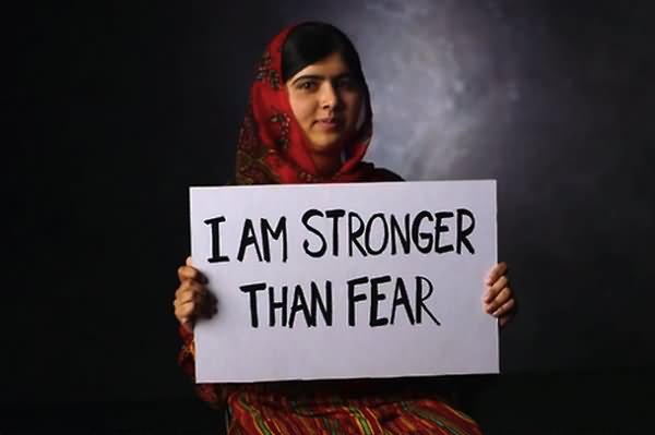 Malala With Banner In Hand I Am Stronger Than Fear Happy Malala Day