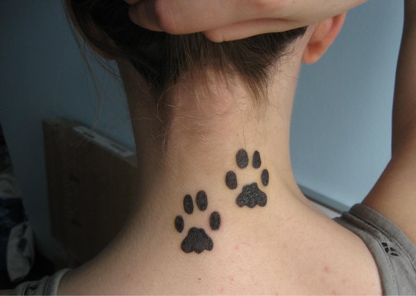 Black Paw Prints Tattoo On Girl Back Neck By Sweetlinaa