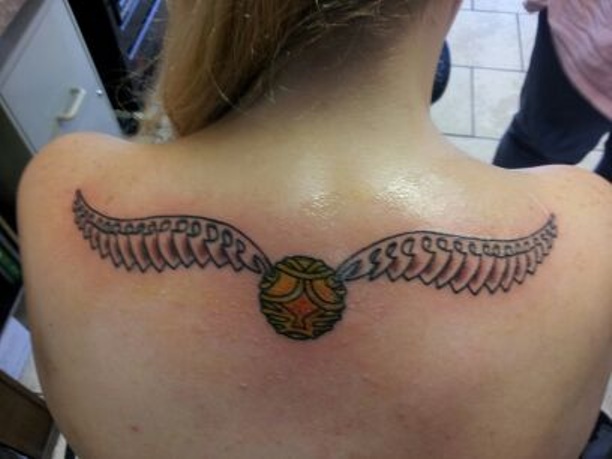 Amazing Snitch Tattoo On Girl Upper Back By Patricia Rakel