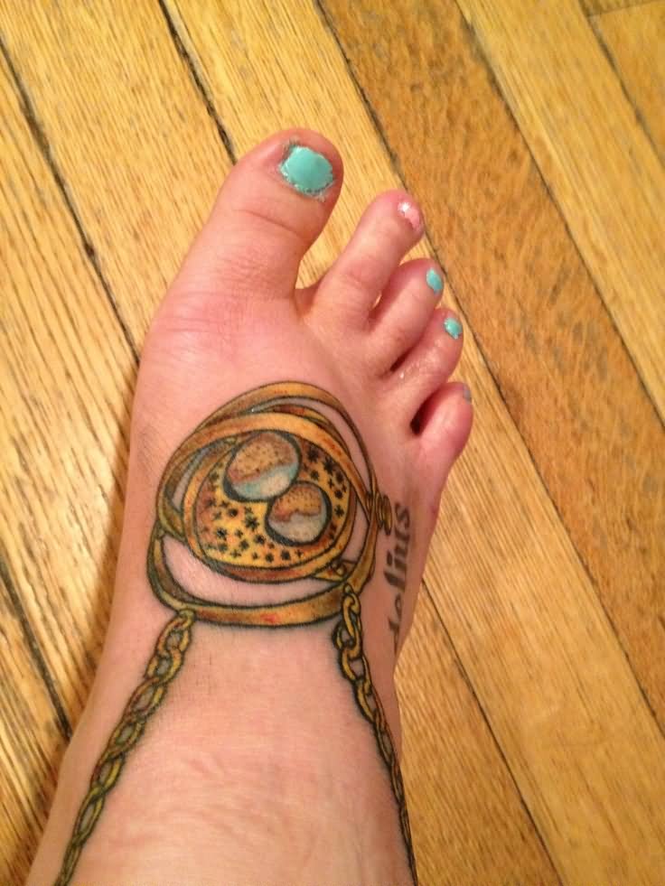 Cool Time Turner Tattoo On Girl Right Foot By Jake Del Bene