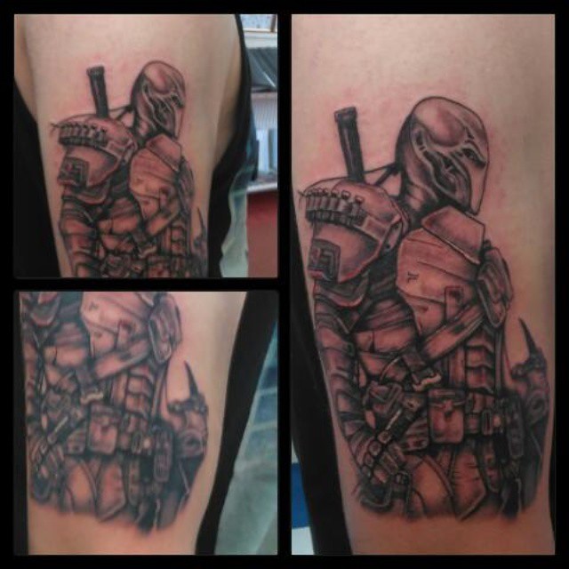 Black And Grey Deathstroke Tattoo On Right Half Sleeve