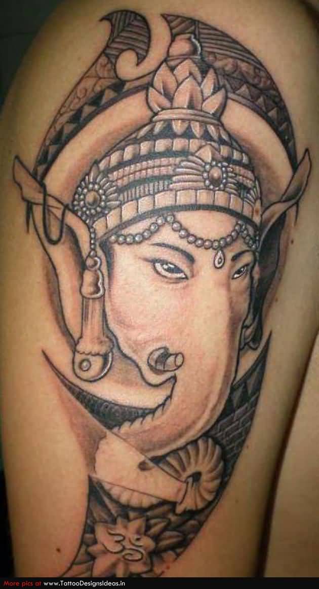 Black And Grey Ganesha Head Tattoo On Shoulder