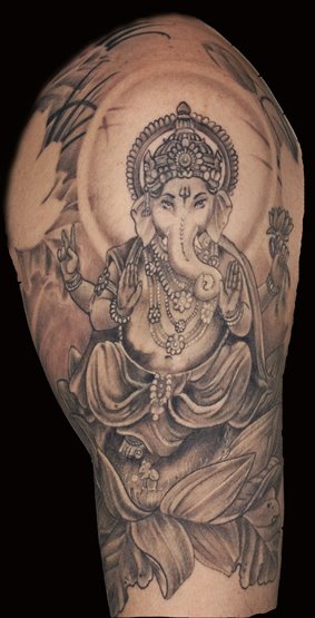 Grey Ink Ganesha Tattoo On Shoulder