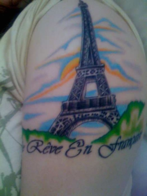 Beautiful Eiffel Tower Tattoo On Left Shoulder