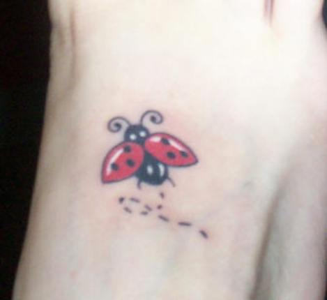 Flying Ladybug Tattoo On Foot