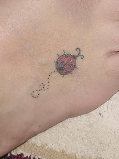 Flying Ladybug Tattoo On Right Foot