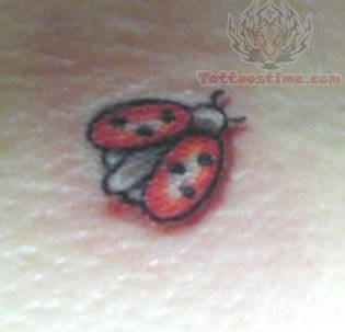 Small Flying Ladybug Tattoo Image