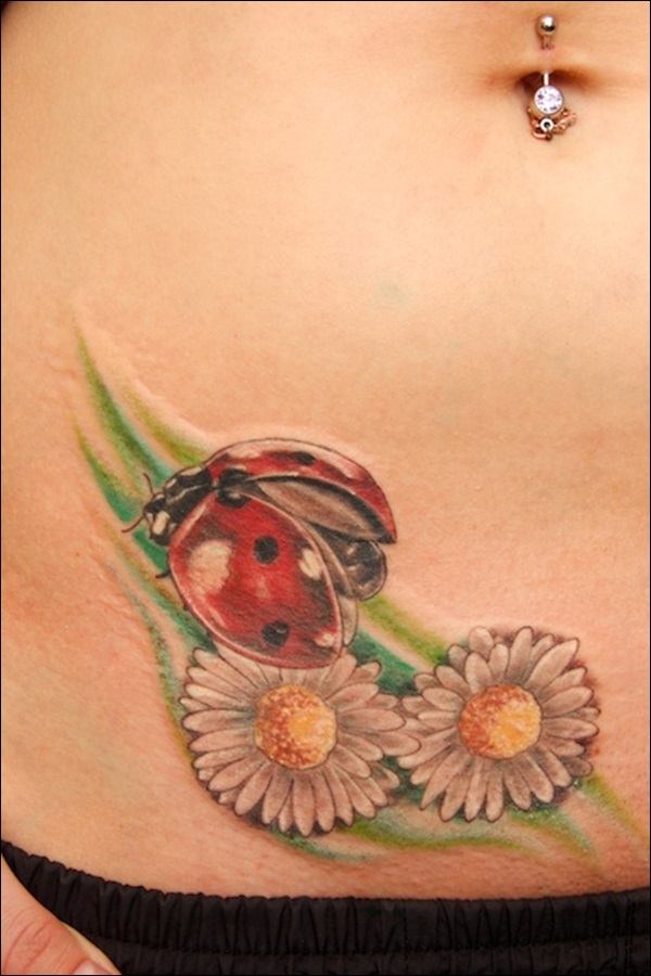 White Daisy Flower And Flying Ladybug Tattoo On Hip