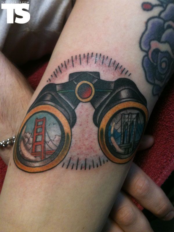 Colored Binoculars Tattoo On Left Arm