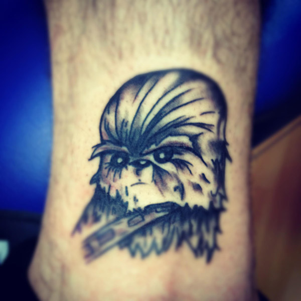 Black And Grey Chewbacca Tattoo On Leg